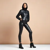 A stylish and confident woman wearing a tight black puffer suit