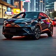 A brand new 2024 Toyota C-HR, showcasing its bold lines and sleek stylish silhouette, parked in a modern urban setting with vibrant city lights reflecting on the car's shiny surface