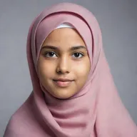 An image of a confident young girl wearing a hijab
