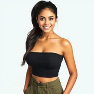 A beautiful Indian woman with long hair styled in a ponytail, displaying a warm smile and captivating eyes