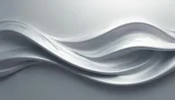 An edgy web background inspired by the edge of a sword, featuring a smooth, metallic silver surface with elegant curves and a flowing design that maintains a sense of sophistication